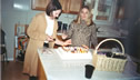 Sarah and Heather Light Candles